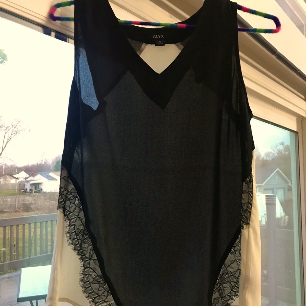 Beautiful sleeveless top can be dressed up or down